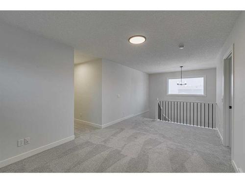 55 Dawson Wharf Mount, Chestermere, AB - Indoor Photo Showing Other Room