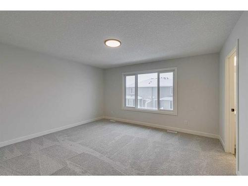 55 Dawson Wharf Mount, Chestermere, AB - Indoor Photo Showing Other Room