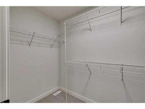 55 Dawson Wharf Mount, Chestermere, AB - Indoor With Storage