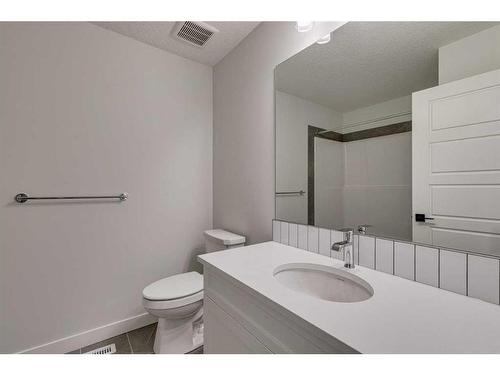 55 Dawson Wharf Mount, Chestermere, AB - Indoor Photo Showing Bathroom