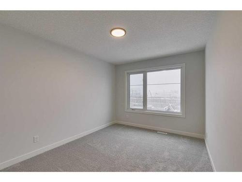 55 Dawson Wharf Mount, Chestermere, AB - Indoor Photo Showing Other Room