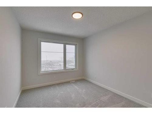 55 Dawson Wharf Mount, Chestermere, AB - Indoor Photo Showing Other Room