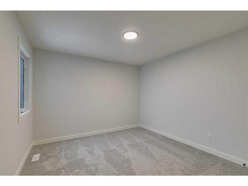 55 Dawson Wharf Mount, Chestermere, AB - Indoor Photo Showing Other Room