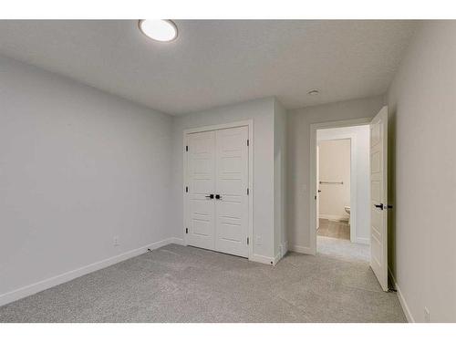 55 Dawson Wharf Mount, Chestermere, AB - Indoor Photo Showing Other Room