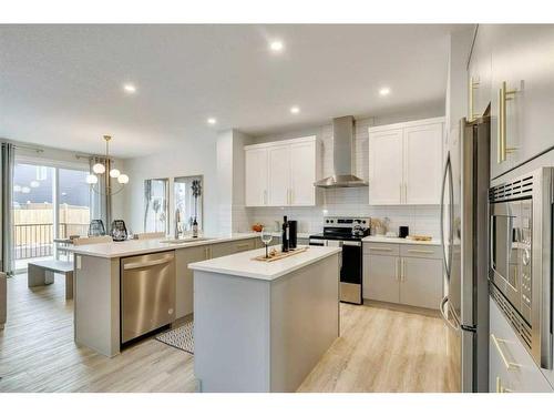 55 Dawson Wharf Mount, Chestermere, AB - Indoor Photo Showing Kitchen With Stainless Steel Kitchen With Upgraded Kitchen