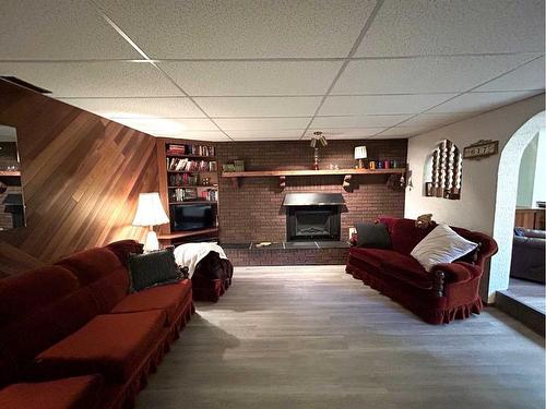 5611 46 Avenue West, Forestburg, AB - Indoor Photo Showing Living Room With Fireplace