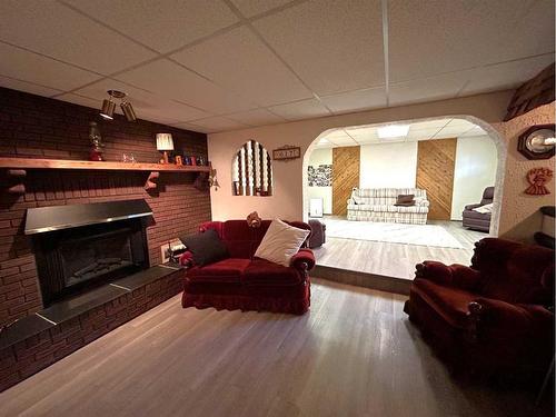 5611 46 Avenue West, Forestburg, AB - Indoor Photo Showing Living Room With Fireplace