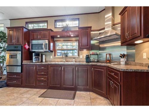 73A-10046 Township Road 422, Rural Ponoka County, AB - Indoor Photo Showing Kitchen With Double Sink