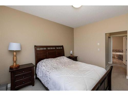 407-4707 50 Street, Sylvan Lake, AB - Indoor Photo Showing Bedroom