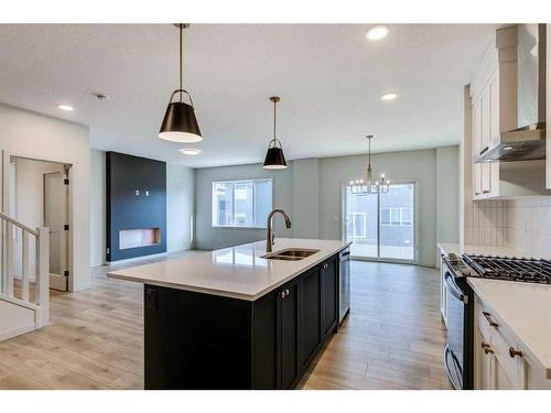 1466 Bayview Point Sw, Airdrie, AB - Indoor Photo Showing Kitchen With Double Sink With Upgraded Kitchen