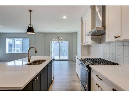 1466 Bayview Point Sw, Airdrie, AB - Indoor Photo Showing Kitchen With Double Sink With Upgraded Kitchen