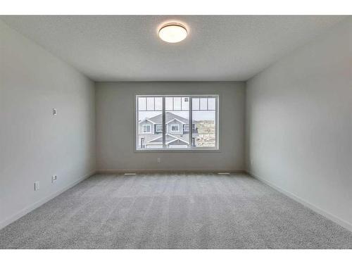 1466 Bayview Point Sw, Airdrie, AB - Indoor Photo Showing Other Room