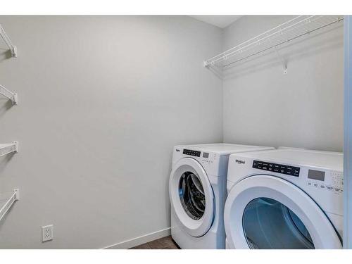 1466 Bayview Point Sw, Airdrie, AB - Indoor Photo Showing Laundry Room