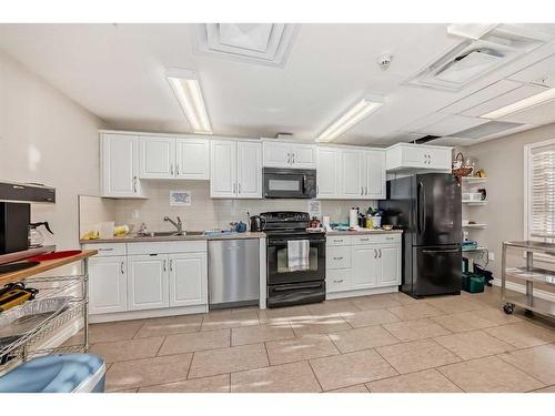 #123-6 Michener Hill Boulevard, Red Deer, AB - Indoor Photo Showing Kitchen With Double Sink