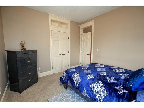 64 Cyprus Road, Blackfalds, AB - Indoor Photo Showing Bedroom