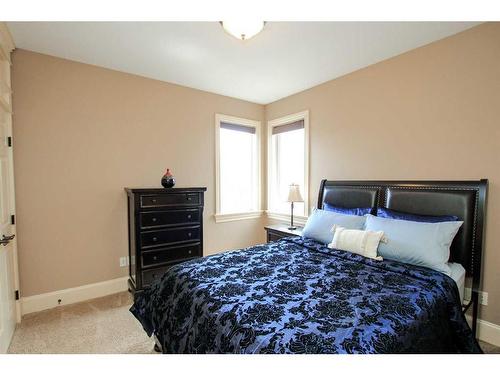 64 Cyprus Road, Blackfalds, AB - Indoor Photo Showing Bedroom