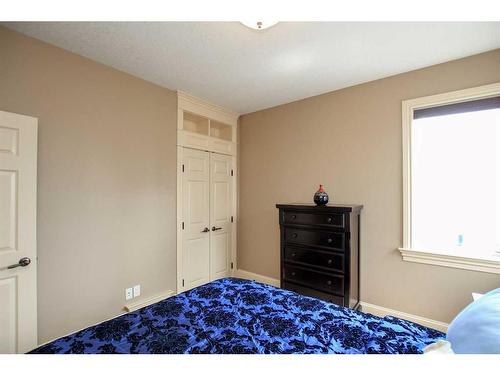 64 Cyprus Road, Blackfalds, AB - Indoor Photo Showing Bedroom