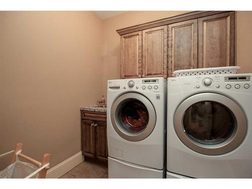 64 Cyprus Road, Blackfalds, AB - Indoor Photo Showing Laundry Room