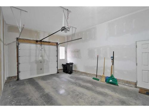 101-150 Vanier Drive, Red Deer, AB - Indoor Photo Showing Garage