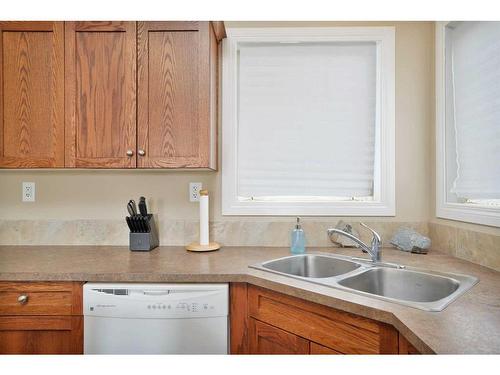 101-150 Vanier Drive, Red Deer, AB - Indoor Photo Showing Kitchen With Double Sink