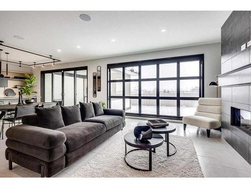 61 Thorkman Avenue, Red Deer, AB - Indoor Photo Showing Living Room With Fireplace