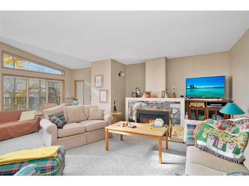 133 Birchcliff Road, Birchcliff, AB - Indoor Photo Showing Living Room With Fireplace