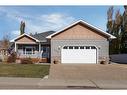 6904 37A Avenue Close, Camrose, AB  - Outdoor With Deck Patio Veranda With Facade 