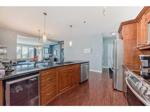 310-4707 50 Street, Sylvan Lake, AB - Indoor Photo Showing Kitchen With Stainless Steel Kitchen With Double Sink