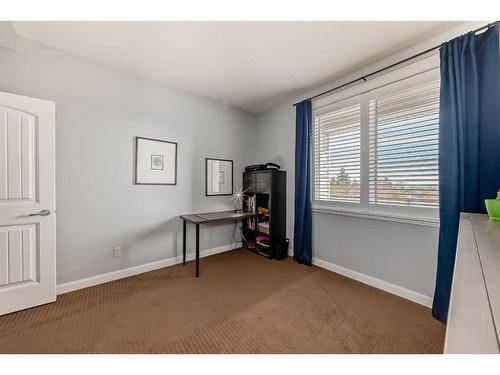 310-4707 50 Street, Sylvan Lake, AB - Indoor Photo Showing Bedroom