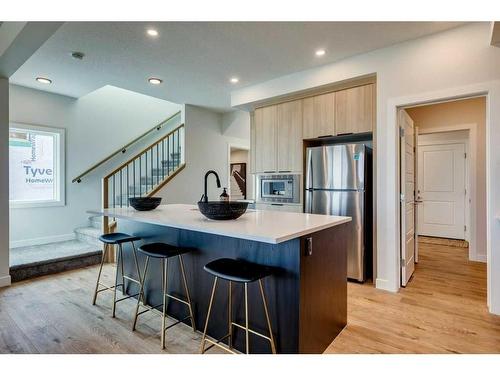 20 Aster Link, Okotoks, AB - Indoor Photo Showing Kitchen With Stainless Steel Kitchen