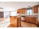 544 Queen Street, Elnora, AB  - Indoor Photo Showing Kitchen With Double Sink 