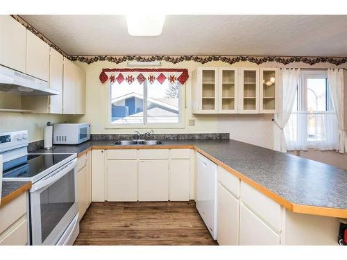 48 Brown Close, Red Deer, AB - Indoor Photo Showing Kitchen With Double Sink