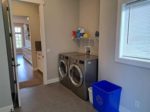 70 Cooperstown Court Sw, Airdrie, AB - Indoor Photo Showing Laundry Room