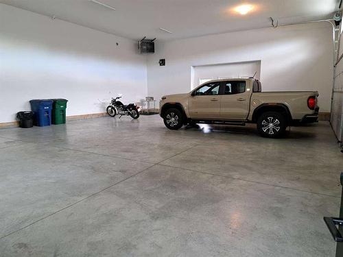 70 Cooperstown Court Sw, Airdrie, AB - Indoor Photo Showing Garage