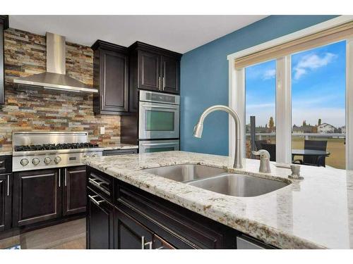 60 Daines Avenue, Red Deer, AB - Indoor Photo Showing Kitchen With Double Sink With Upgraded Kitchen