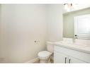 240-248 Halifax Close, Penhold, AB  - Indoor Photo Showing Bathroom 