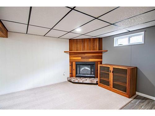 5036 48 Avenue, Bashaw, AB - Indoor With Fireplace