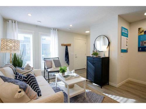 201 Vantage Drive, Cochrane, AB - Indoor Photo Showing Living Room