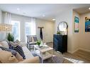 201 Vantage Drive, Cochrane, AB  - Indoor Photo Showing Living Room 