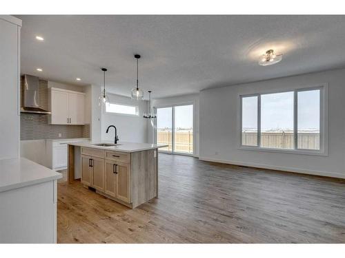 529 Grayling Bend, Rural Rocky View County, AB - Indoor Photo Showing Kitchen With Upgraded Kitchen