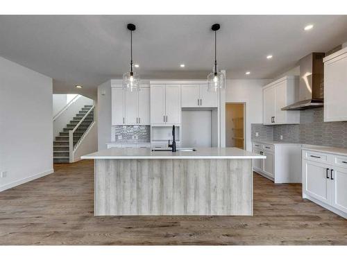 529 Grayling Bend, Rural Rocky View County, AB - Indoor Photo Showing Kitchen With Upgraded Kitchen