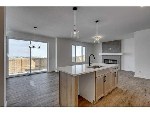 529 Grayling Bend, Rural Rocky View County, AB - Indoor Photo Showing Kitchen With Upgraded Kitchen