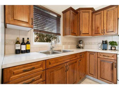 3 Fir Close, Sylvan Lake, AB - Indoor Photo Showing Kitchen With Double Sink