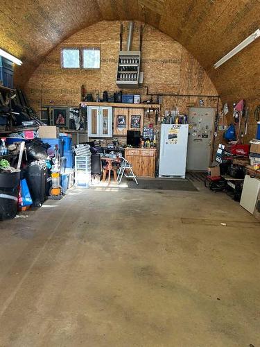 6E West Ghost Road, Benchlands, AB - Indoor Photo Showing Garage