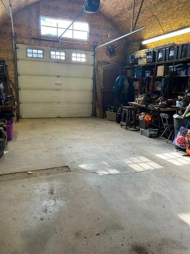 6E West Ghost Road, Benchlands, AB - Indoor Photo Showing Garage