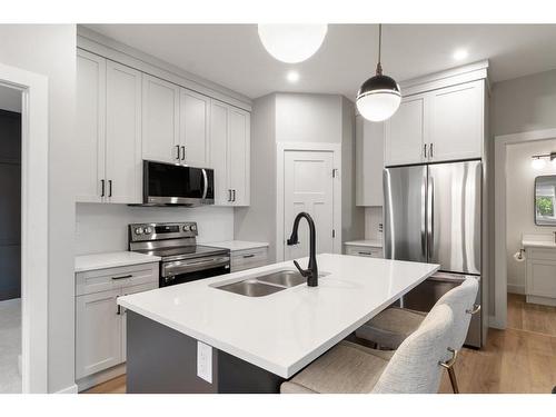 2-5324 49 Avenue, Lacombe, AB - Indoor Photo Showing Kitchen With Double Sink With Upgraded Kitchen