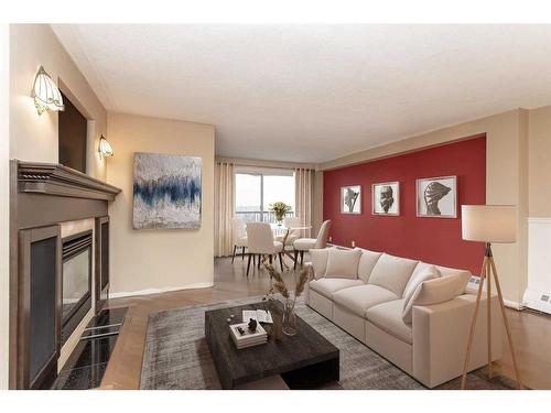 402-4326 Michener Drive, Red Deer, AB - Indoor Photo Showing Living Room With Fireplace