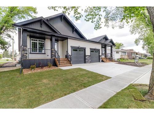 4-5324 49 Avenue, Lacombe, AB - Outdoor With Deck Patio Veranda With Facade