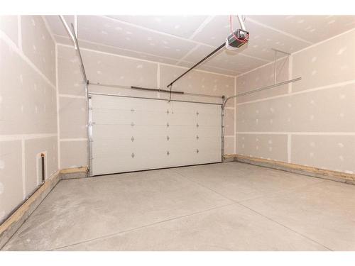 20 Toal Close, Red Deer, AB - Indoor Photo Showing Garage