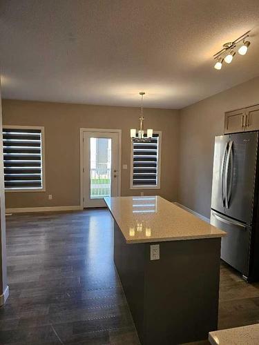 202-148 Vanier Drive, Red Deer, AB - Indoor Photo Showing Kitchen